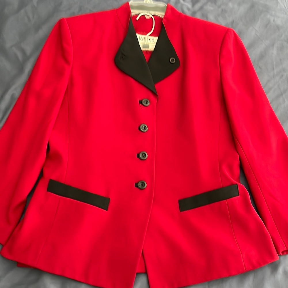 Skirt suit from Kasper.  Lined.  50% polyester 60% Acetate.